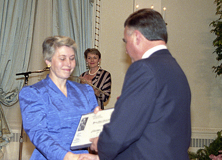 Constance Sampson accepts Citation of Merit from Governor General Ray Hnatyshyn.