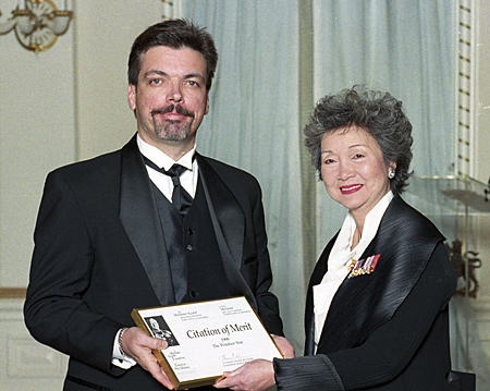 Marty Beneteau accepts Citation of Merit from Governor General Adrienne Clarkson.