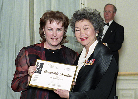 Susanne Craig accepts accepts award from Governor General Adriene Clarkson.