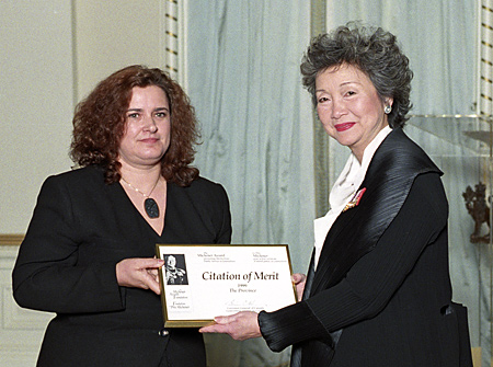 Ann Rees accepts Citation of Merit from Governor General Adrienne Clarkson.