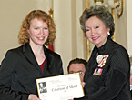 Reporter Sue Bailey accepts the 2001 Michener Citation of Merit from Governor General Adrienne Clarkson.