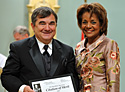 David Estok accepts Citation of Merit from Governor General Micha&euml;lle Jean.