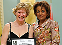 Margo Goodhand accepts Citation of Merit from Governor General Micha&euml;lle Jean.