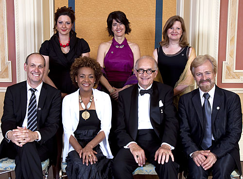 Governor General Micha&euml;lle 
                Jean with the editorial staff of SRC's television program Enqu&ecirc;te