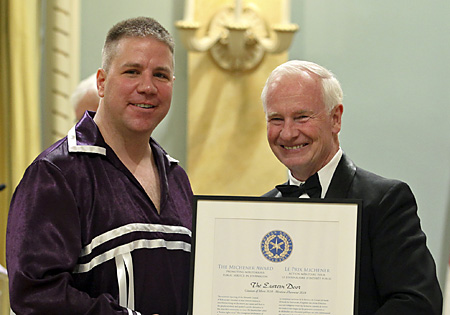 Steve Bonspiel accepts 2010 Michener Citation of Merit from Governor General David Johnston.