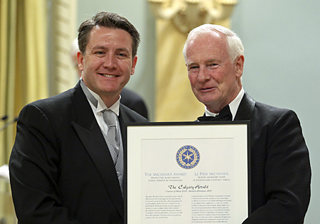 Lorne Motley receives Citation of Merit from Governor General Johnston.