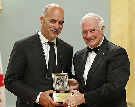 Gerry Nott accepts Michener Award from Governor General David Johnston.