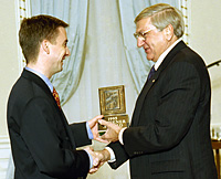 Michael McAuliffe accepts Michener Award from Governor General LeBlanc.