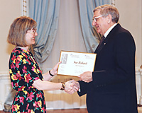 Sue Ridout accepts Fellowship award from the Governor General.