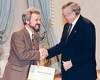 Pierre Sormany accepts Fellowship award from the Governor General.