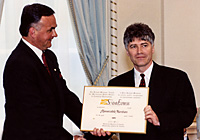 Michael Harris, publisher and editor-in-chief receives an 'Honourable Mention' award from Governor General Ramon Hnatyshyn.