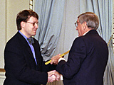 Michel Venn accepts Fellowship from Governor General Rom&eacute;o LeBlanc.