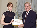 Reporter Kim Lunman accepts 1997 Michener Citation of Merit from Chief Justice Antonio Lamer.