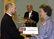Her Excellency Adrienne Clarkson presents the 2003 Michener Citation of Merit to reporter Dan Zakreski representing CBC Television.